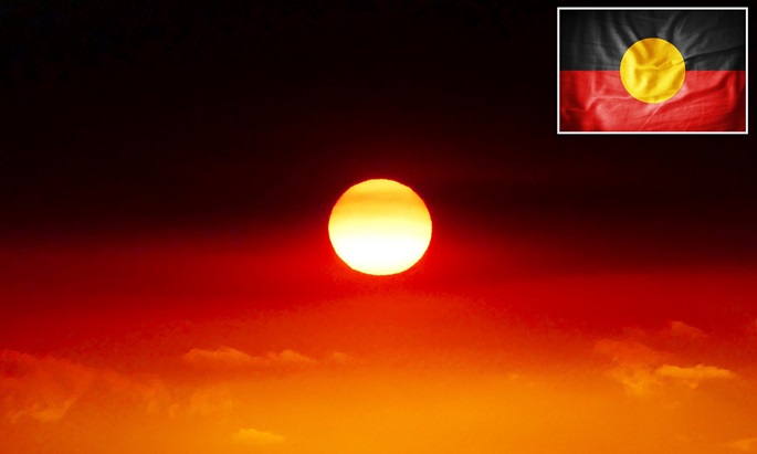 sunset as a presentation of the Australian aboriginal flag 